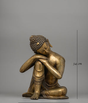 Buddha Statue with Head Resting on Knee