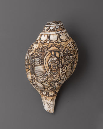 conch-with-guru-rinpoche-carving