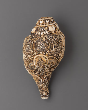 three-dhyani-buddha-and-tara-carved-conch