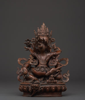 Tibetan Dzambhala statue with consort