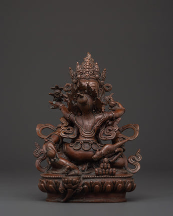 Tibetan Dzambhala statue with consort