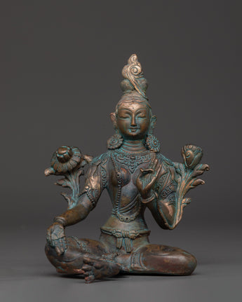 peaceful green tara statue