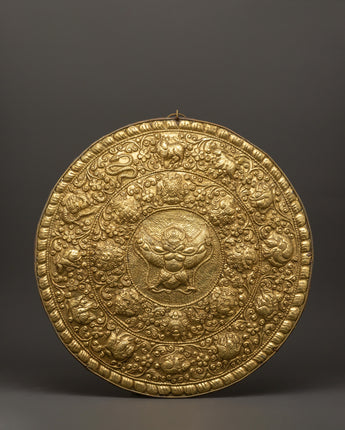 metal-thangka-with-garuda-and-sacred-symbols