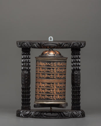 prayer-wheel-with-tibetan-mantras-carved
