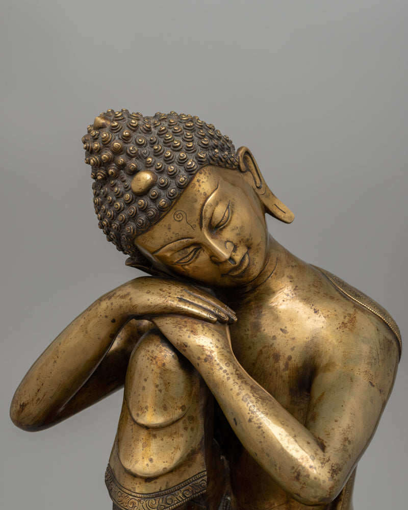 Buddha Statue with Head Resting on Knee