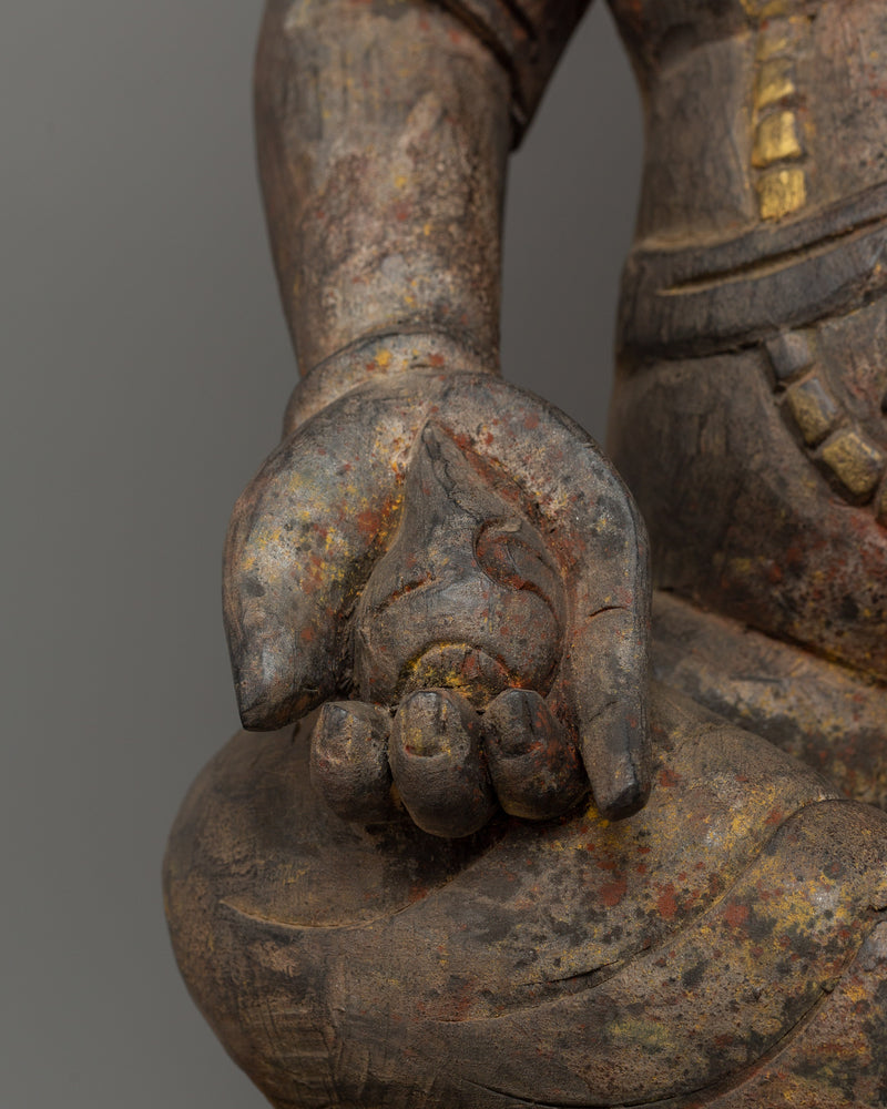 Dzambhala Seated on a Lotus Base | The Buddhist Deity of Wealth