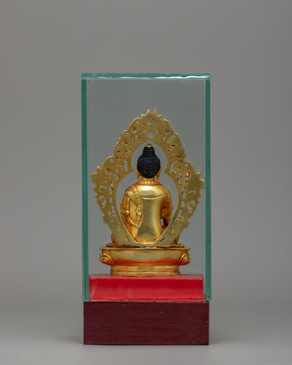 Glass-Enclosed Shakyamuni Buddha Statue | Meditative Lotus Pedestal Figure