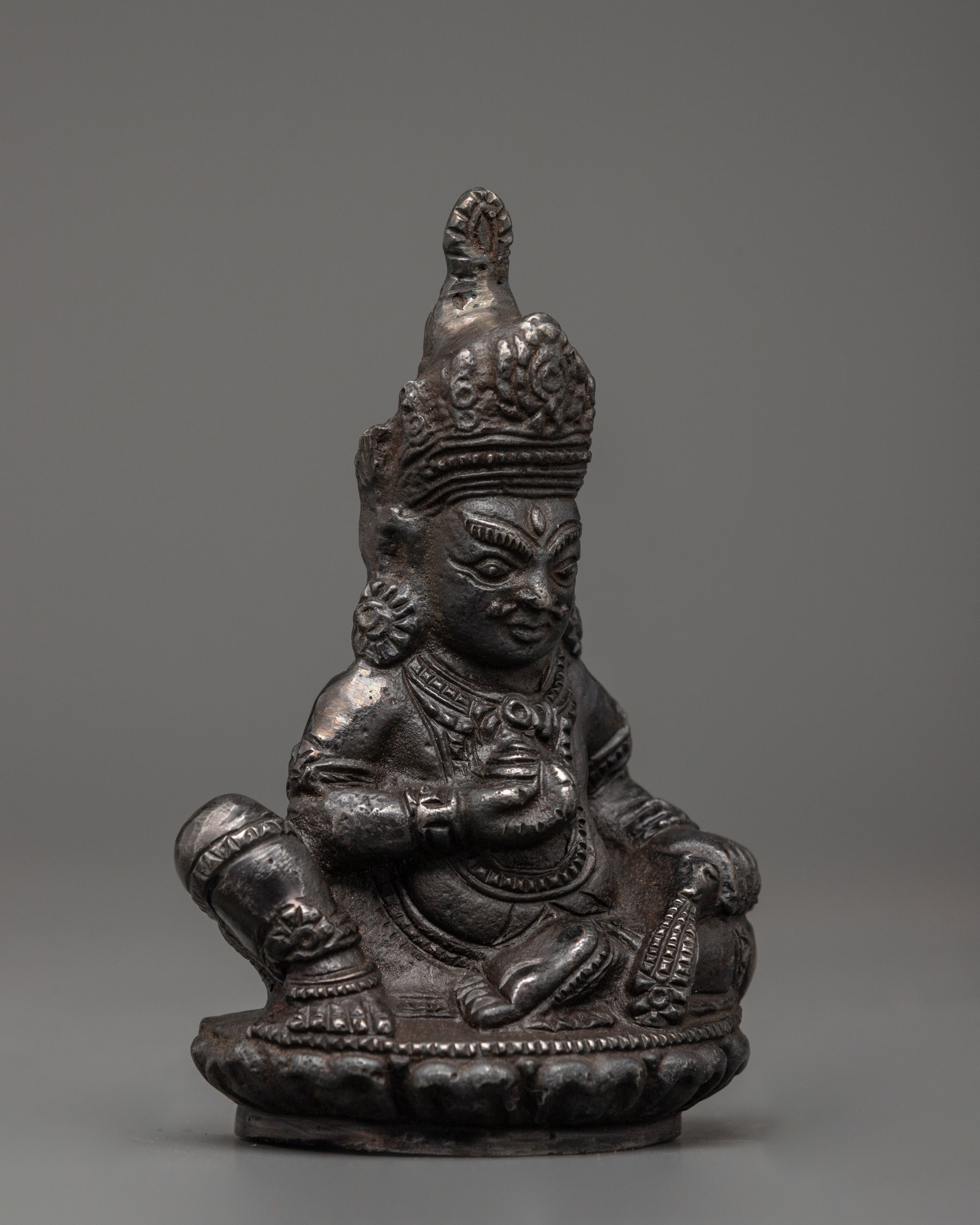 Iron Dzambhala Wealth Deity Figurine | Symbol of Abundance