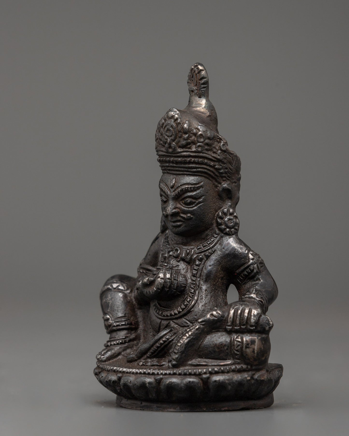 Iron Dzambhala Wealth Deity Figurine | Symbol of Abundance