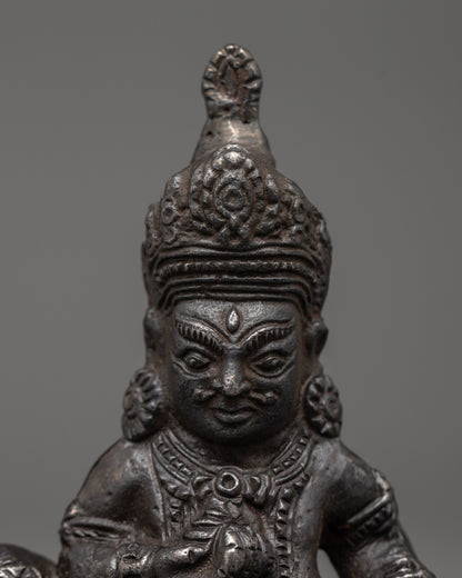 Iron Dzambhala Wealth Deity Figurine | Symbol of Abundance