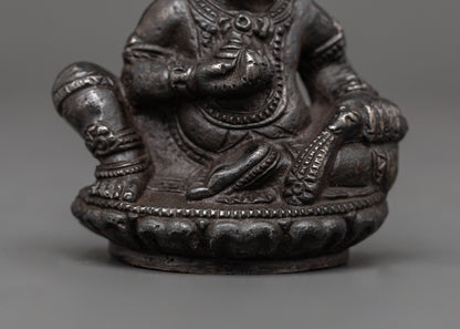 Iron Dzambhala Wealth Deity Figurine | Symbol of Abundance