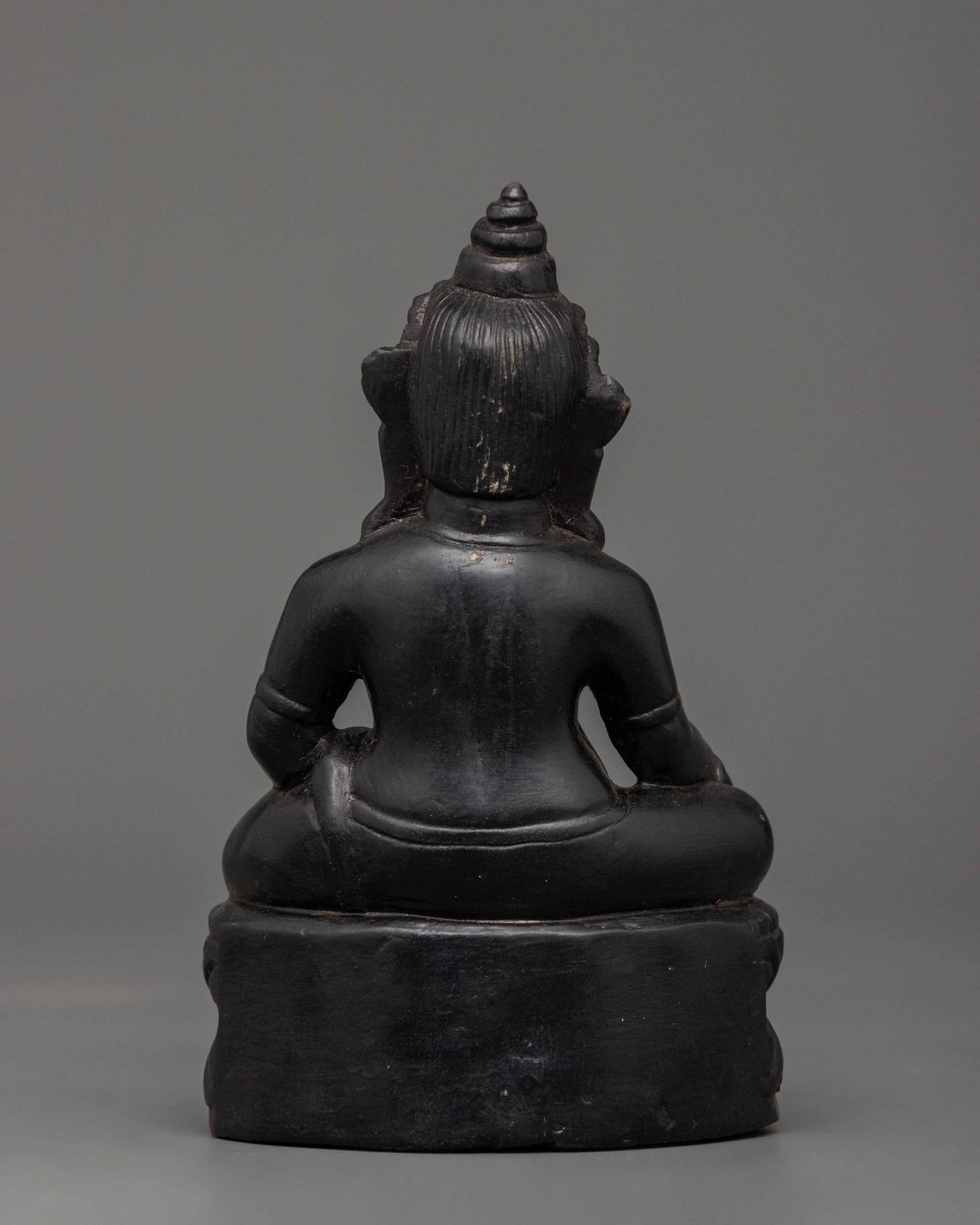 Dzambhala Oxidized Stone Statue | A Symbol of Wealth