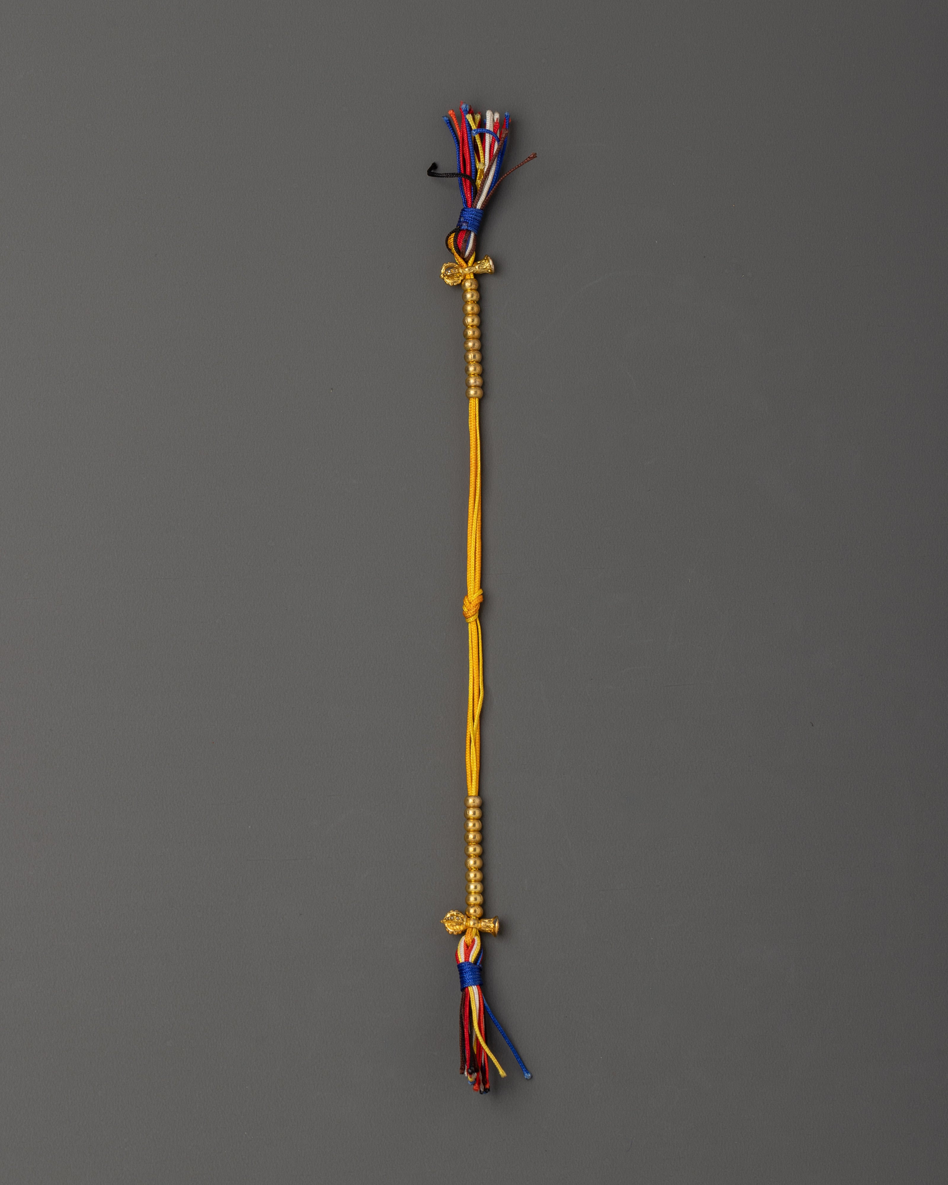 Handcrafted Tibetan Chupsel | Buddhist Ritual String with Gold Color Tassels