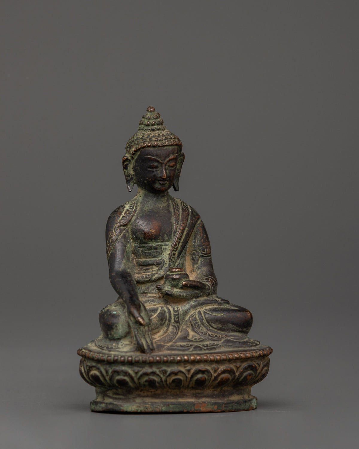Tibetan Ratnasambhara Buddha Statue | Oxidized Copper Spiritual Sculpture