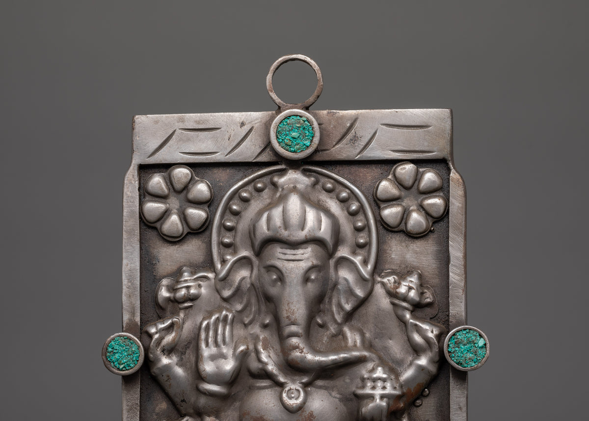 Hand-carved Ganesh Wall Hanging | Iron & Turquoise Stone Sculpture