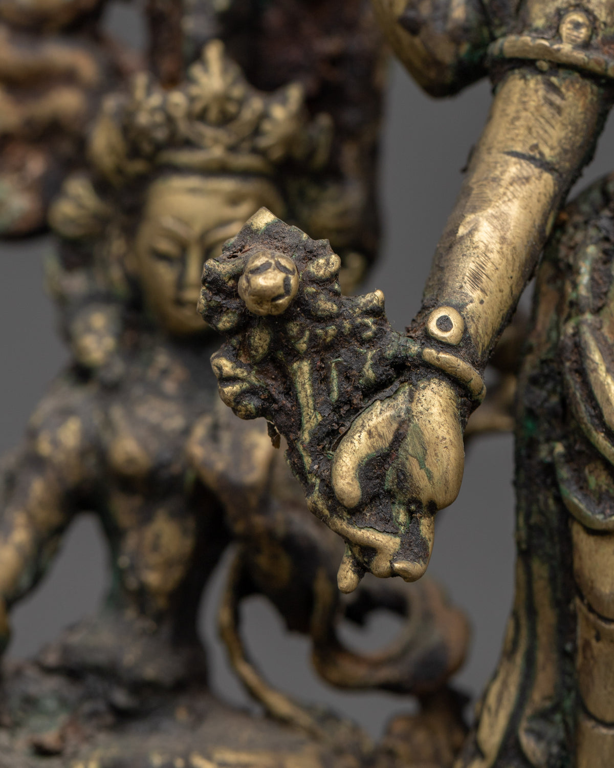 Brass Oil Lamp - Decorated with Avalokiteshvara, Vasudhara & Ganesh