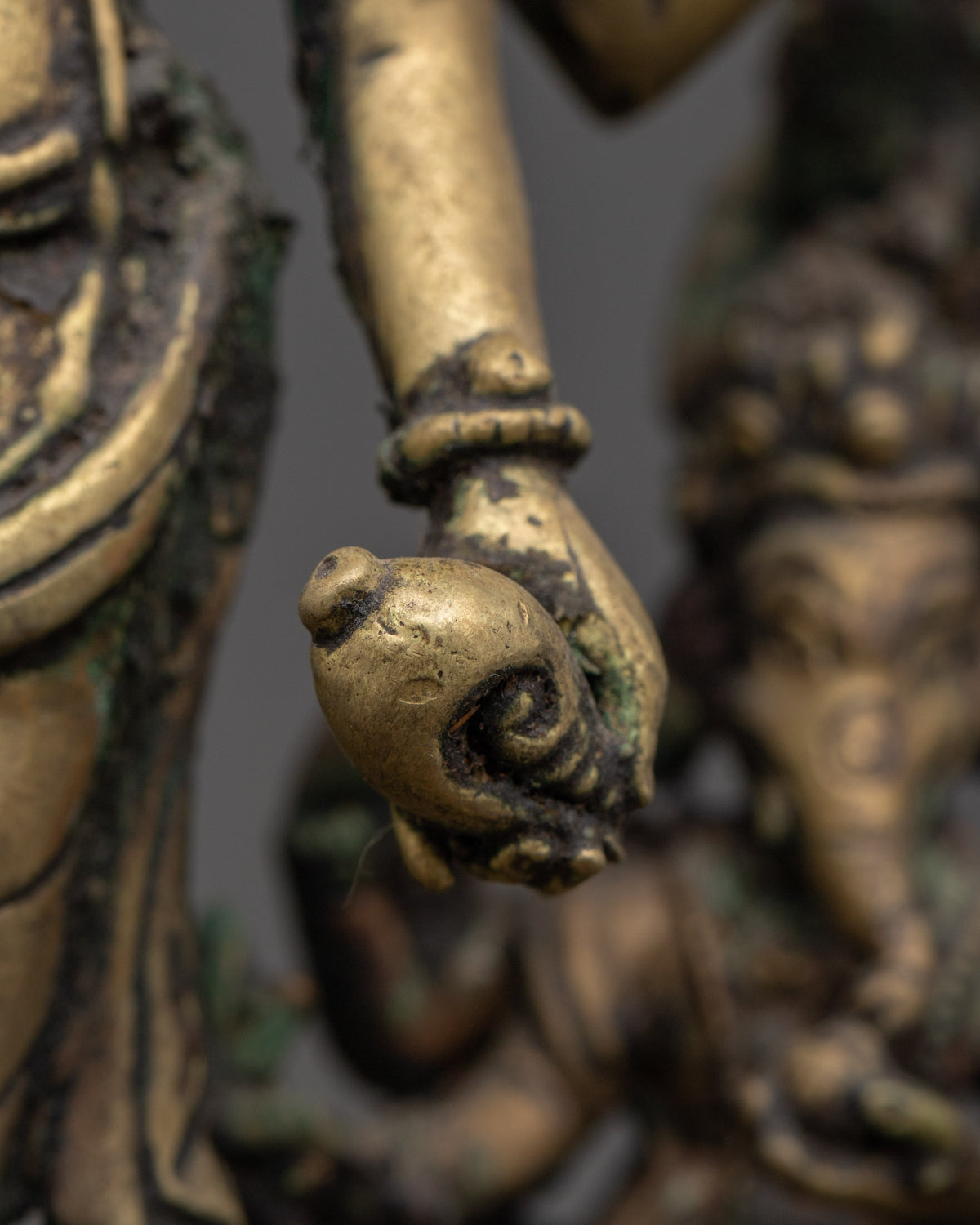 Brass Oil Lamp - Decorated with Avalokiteshvara, Vasudhara & Ganesh