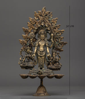 Brass Oil Lamp - Decorated with Avalokiteshvara, Vasudhara & Ganesh