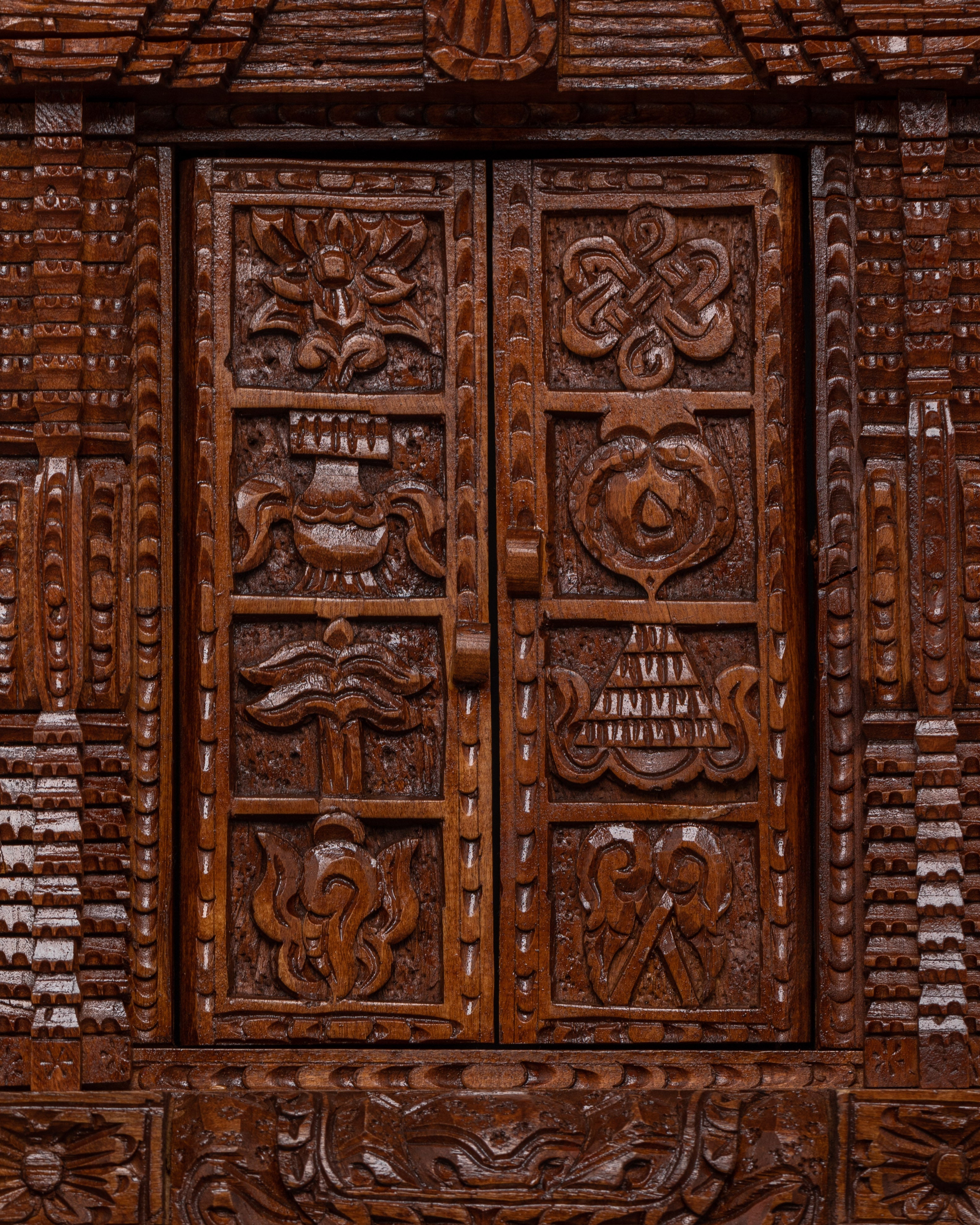 Auspicious Symbols Engraved Wall Hanging – Hand-Carved Wooden Spiritual Decor