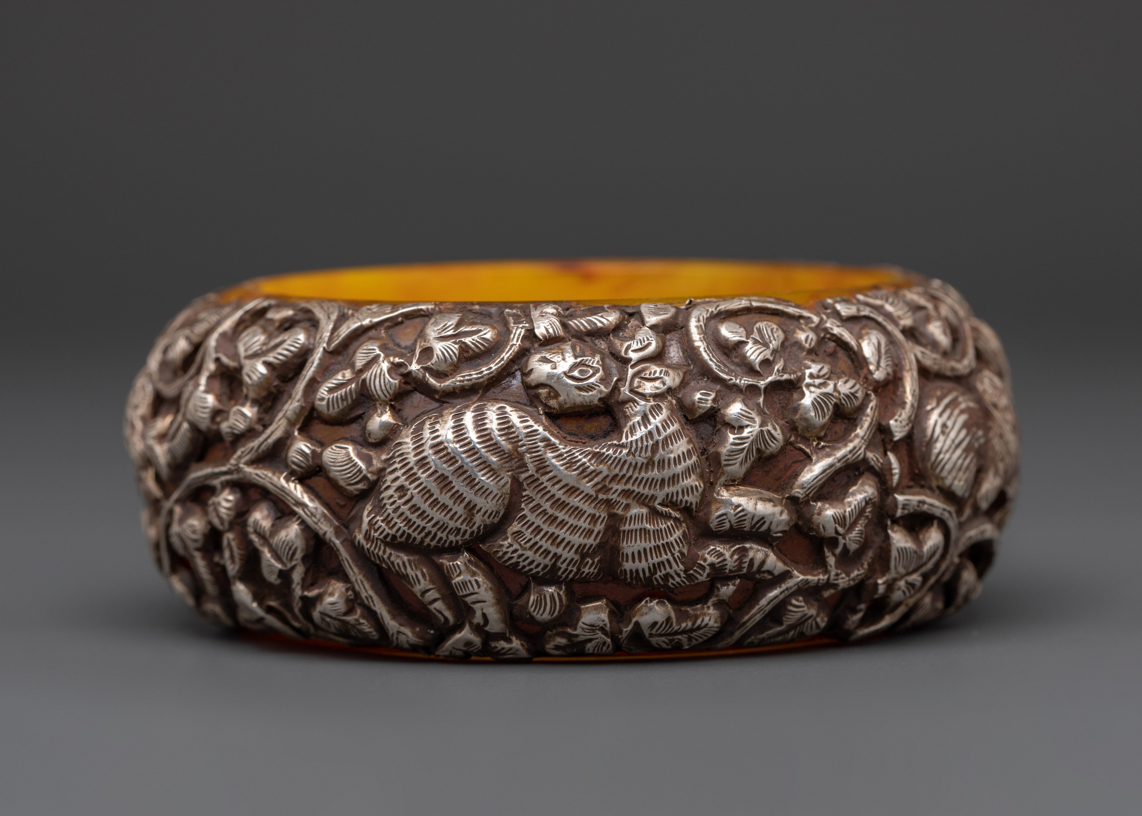 Tibetan Silver Plated Bangle | Carved Resin Jewelry