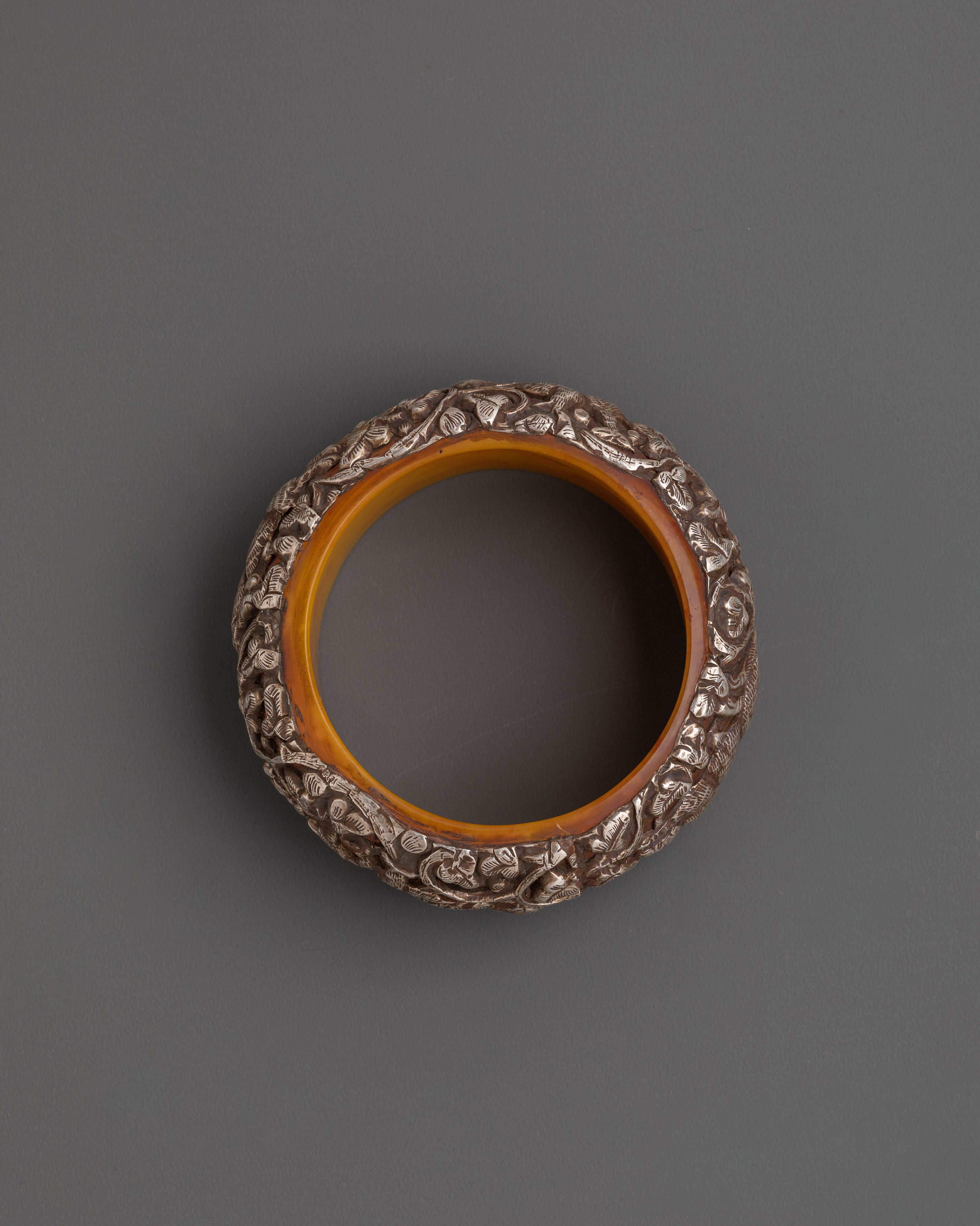 Tibetan Silver Plated Bangle | Carved Resin Jewelry