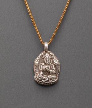 Handcrafted Buddhist deity pendant