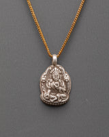 Handcrafted Buddhist deity pendant