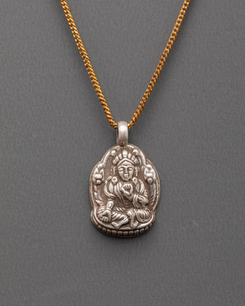 Handcrafted Buddhist deity pendant