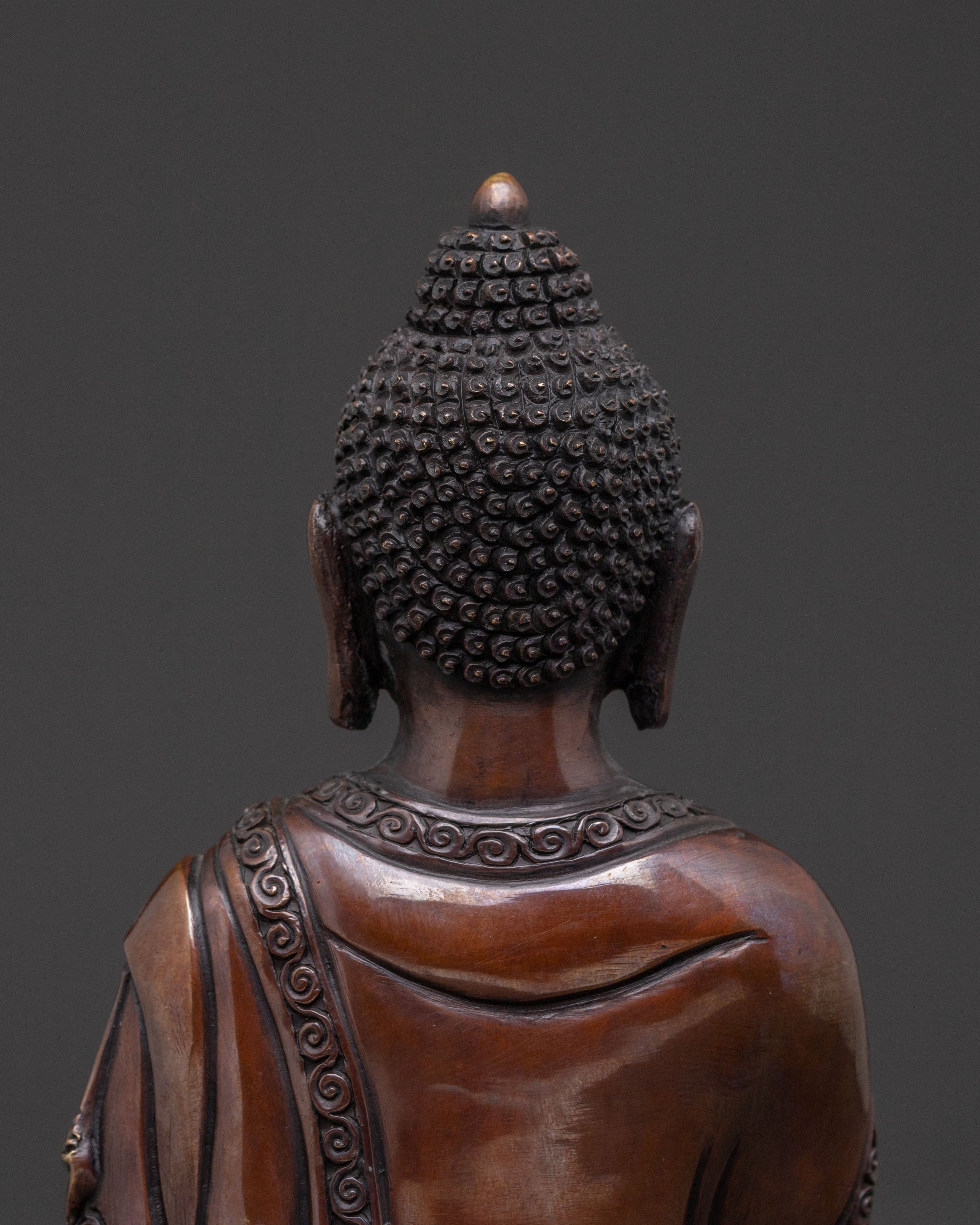 Historical Shakyamuni Buddha: Oxidized Copper Statue