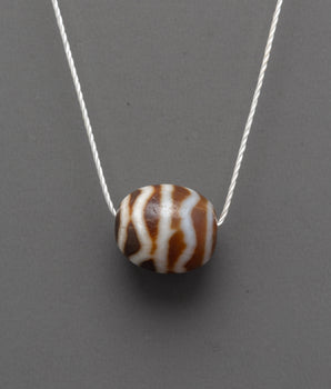 Sacred Tibetan Dzi Bead Locket | Spiritual Pendant for Protection and Blessings