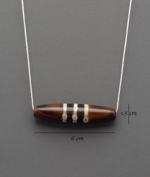 Dzi Bead Jewelry | Sacred Amulet for Protection