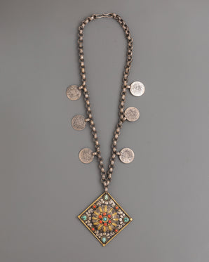 Handmade silver locket with intricate design