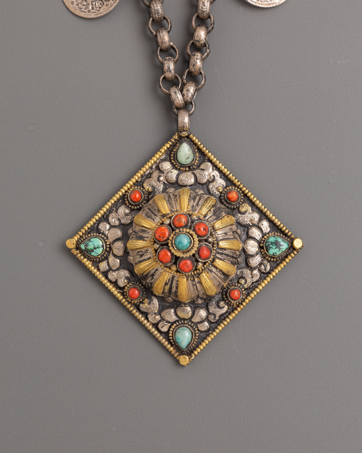Handmade Silver Locket with Intricate Design | Coral Turquoise Buddhist Amulet