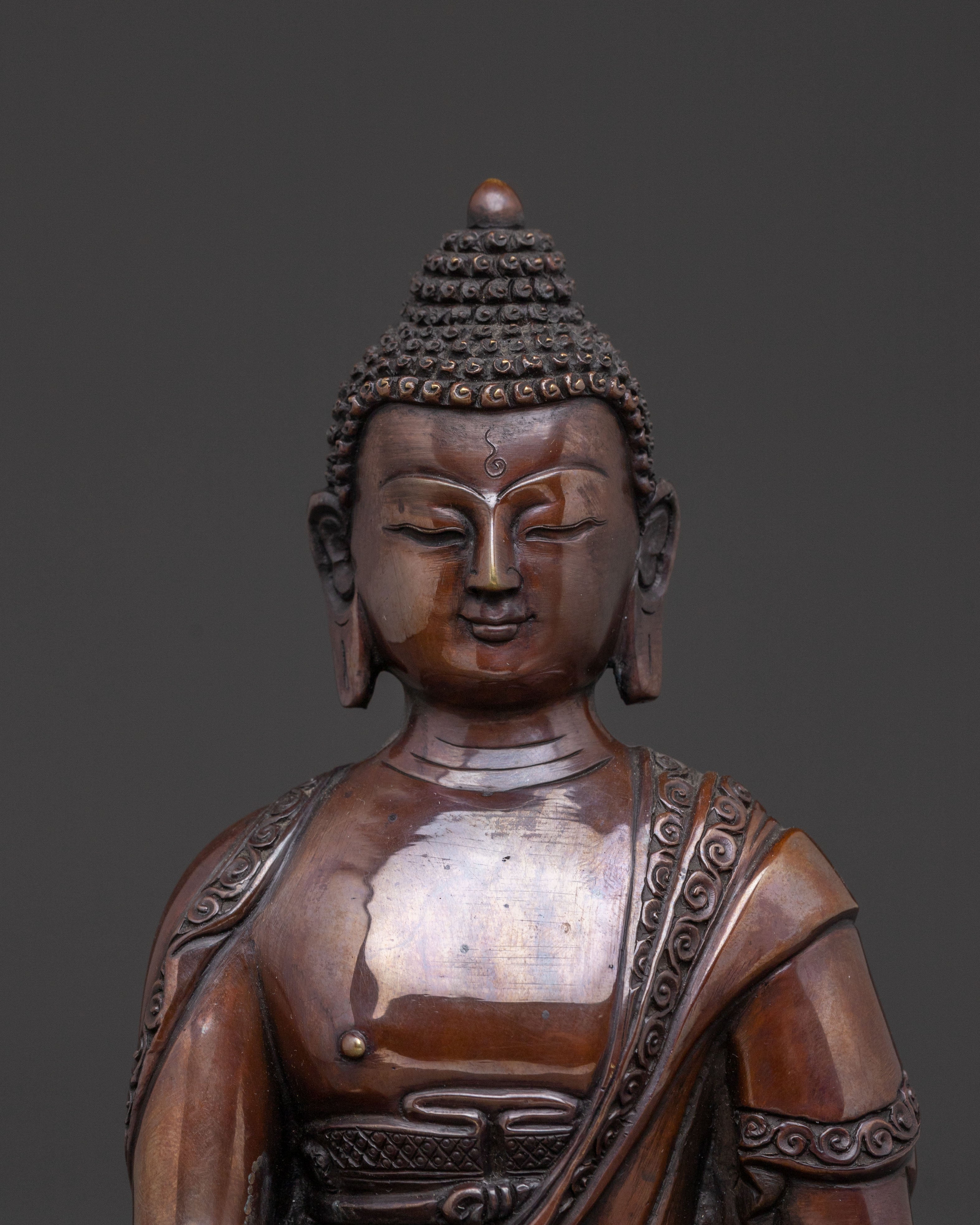 Historical Shakyamuni Buddha: Oxidized Copper Statue