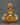 yellow dzambhala copper sculpture