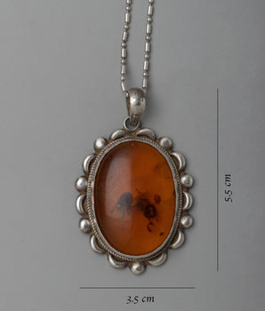 Silver Amber Pendent | Classic Beauty with a Touch of Nature