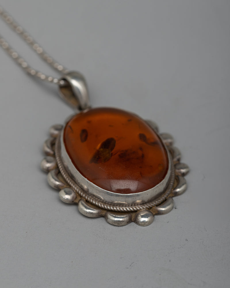 Silver Amber Pendent | Classic Beauty with a Touch of Nature