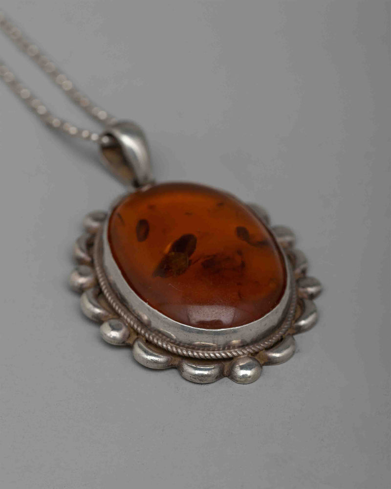 Silver Amber Pendent | Classic Beauty with a Touch of Nature