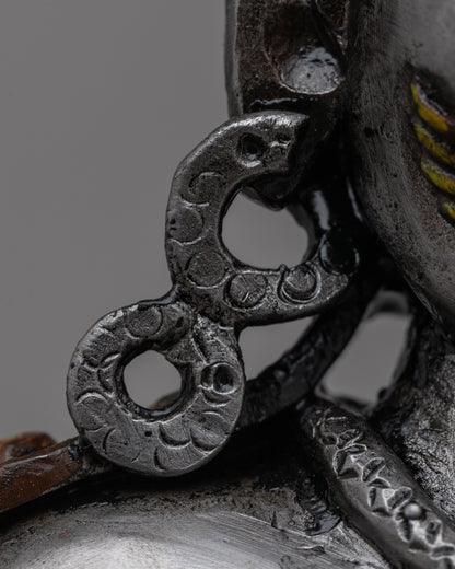 Iron Black Dzambhala Statue | Symbol of Prosperity and Spiritual Abundance