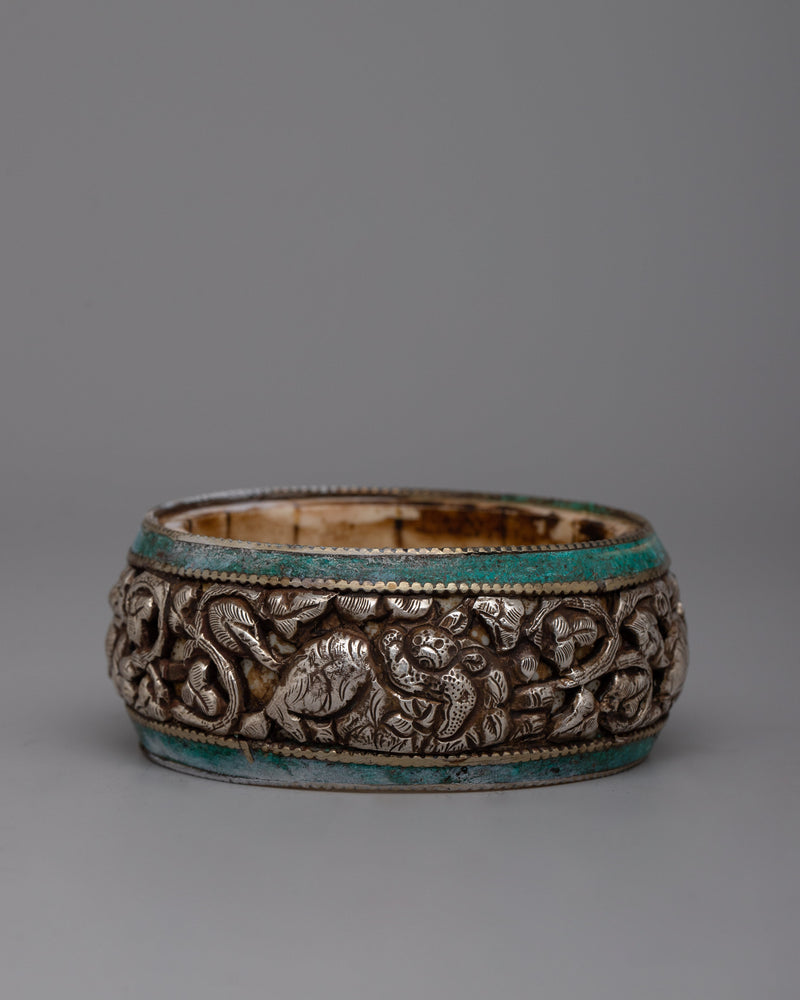 Silver Buddhist Bangle | Reflecting Inner Peace through Intricate Floral Designs