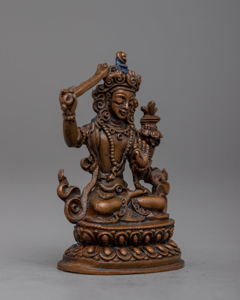 Manjushri Statue Tibétain | Expertly Crafted in Oxidized Copper Using Machine