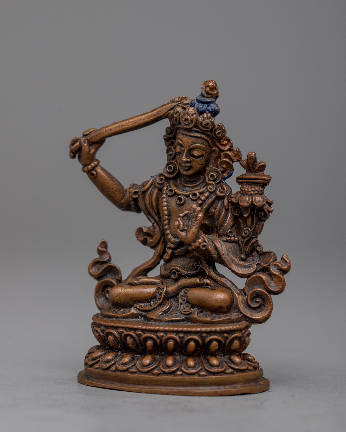 Manjushri Statue Tibétain | Expertly Crafted in Oxidized Copper Using Machine