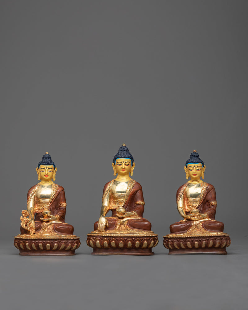 three wise buddha statues