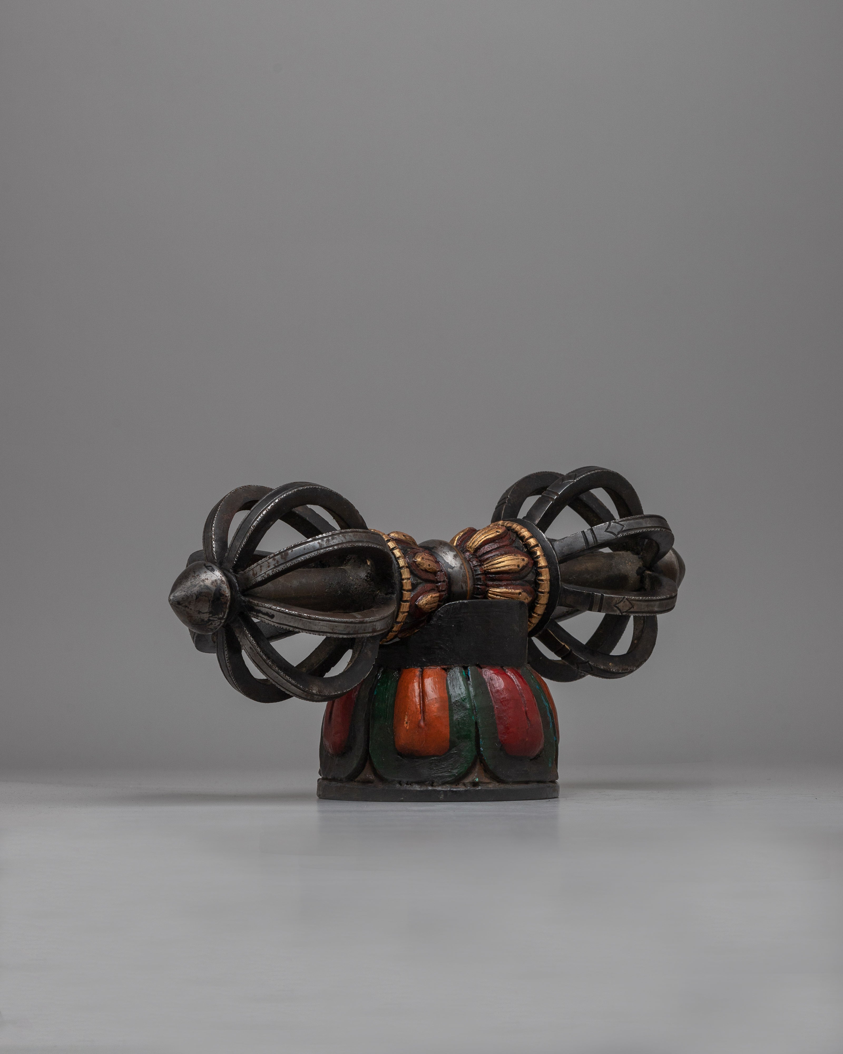 Tibetan Vajra on Wooden Stand | Fusion of Spiritual Symbolism and Natural Elegance