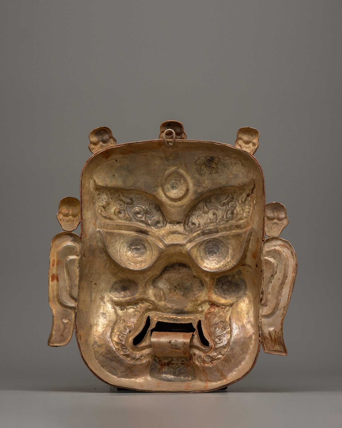 Copper Bhairav Mask | Unveiling the Majesty of a Golden Guardian