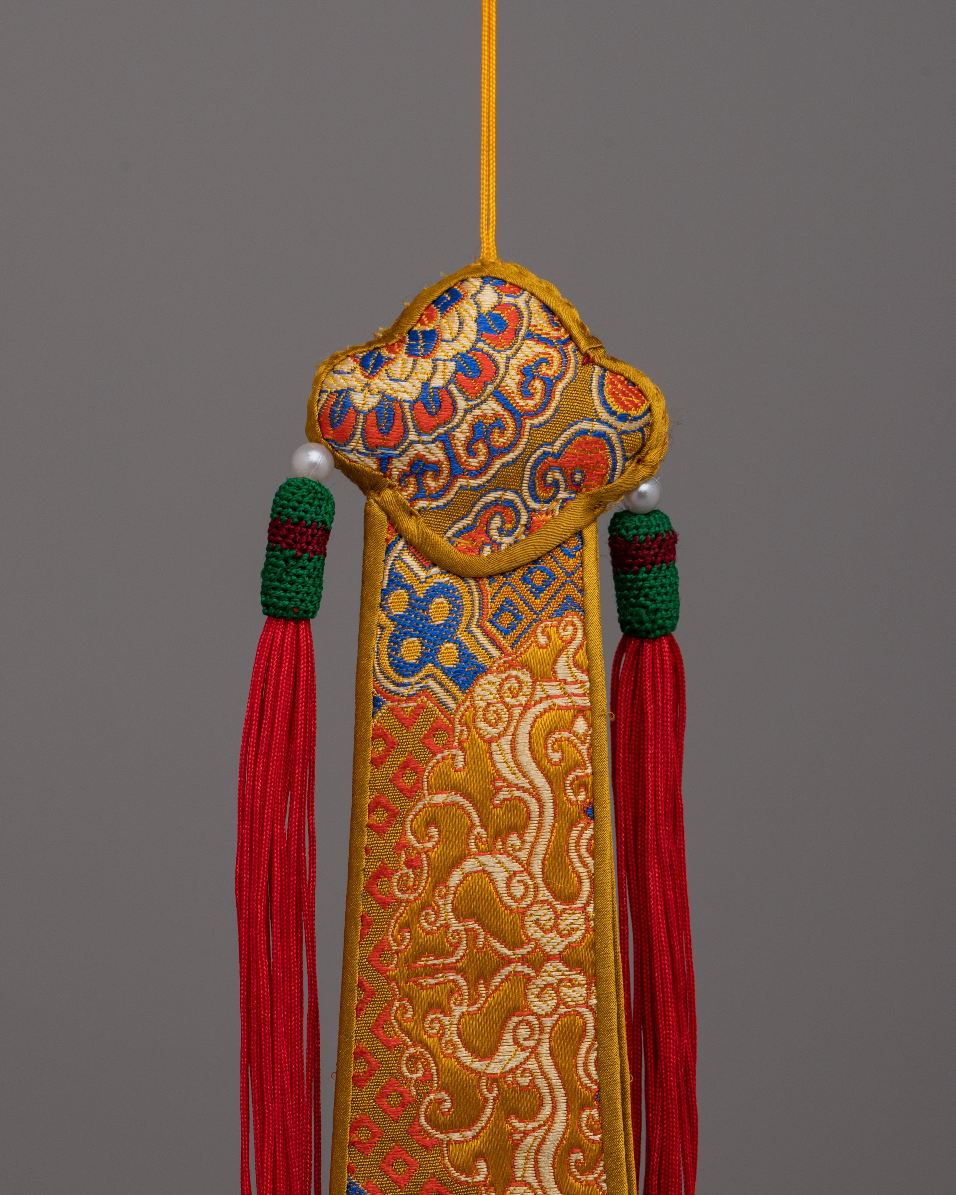 Damaru Tail Lappet | Cultural Heritage Expressed in Handcrafted Art