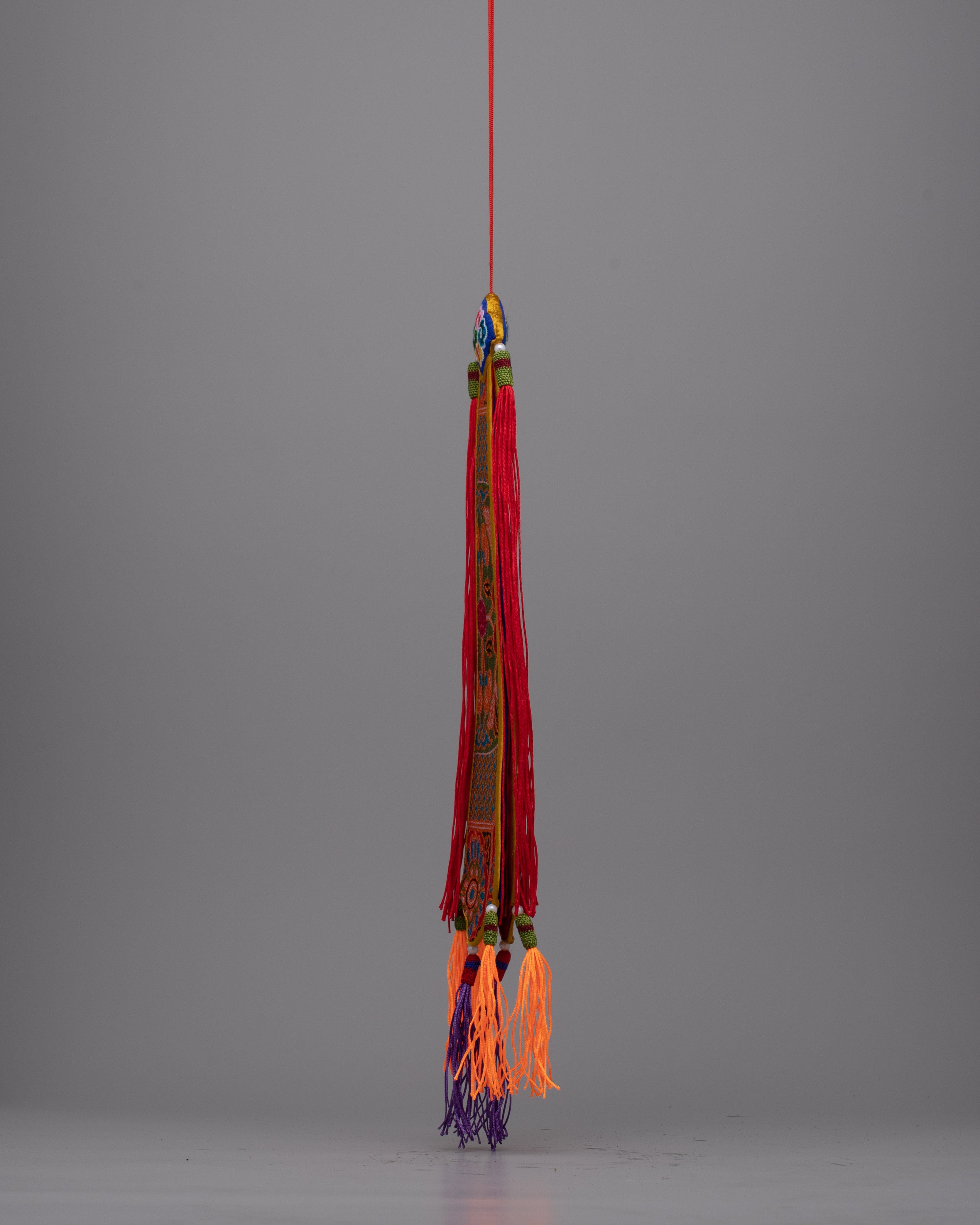Dharma Damaru Tail | Detailed Elegance Reflecting Spiritual Resonance