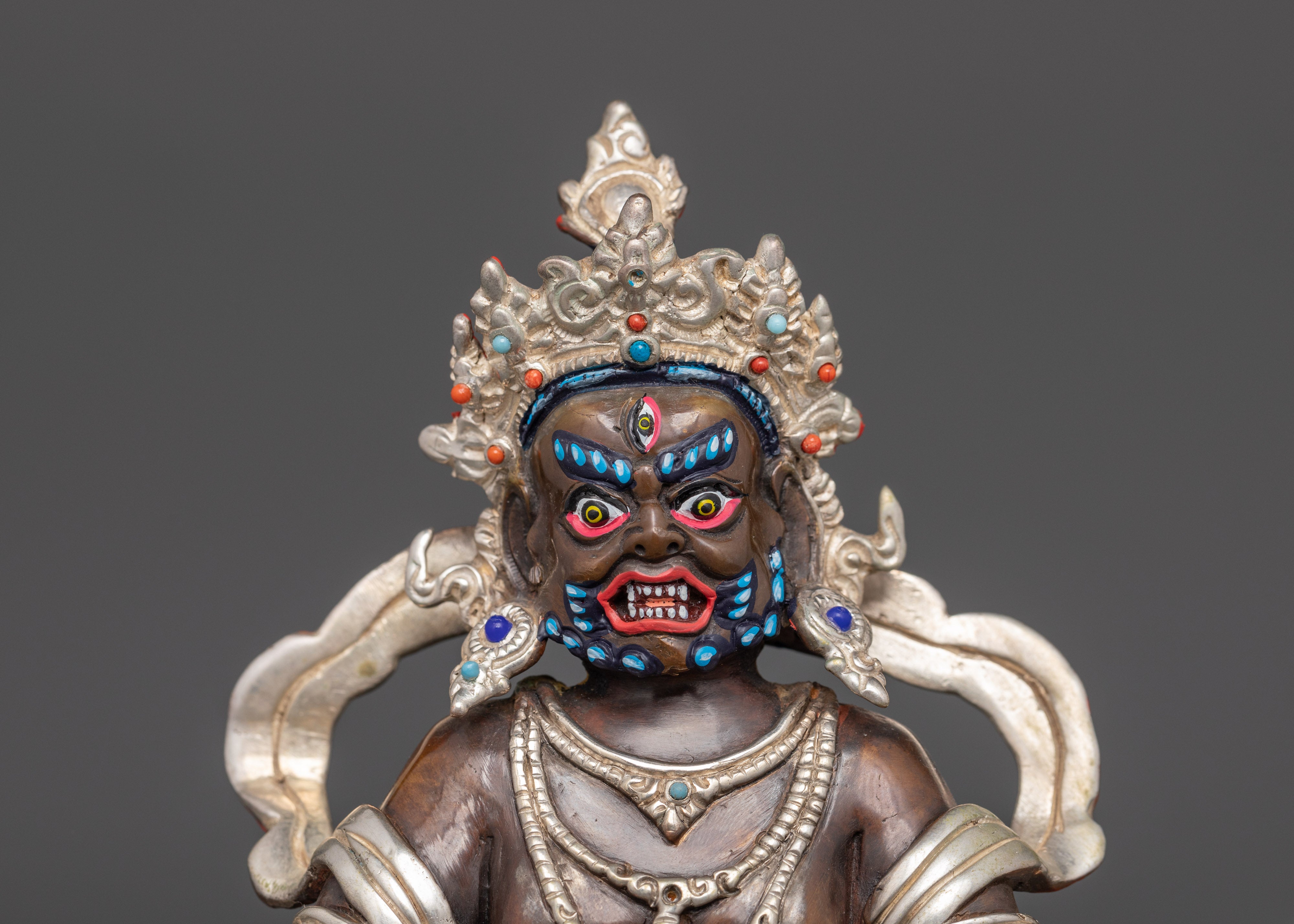 Sacred Dzambhala Figurine | Oxidized Copper and Silver-Plated Statue