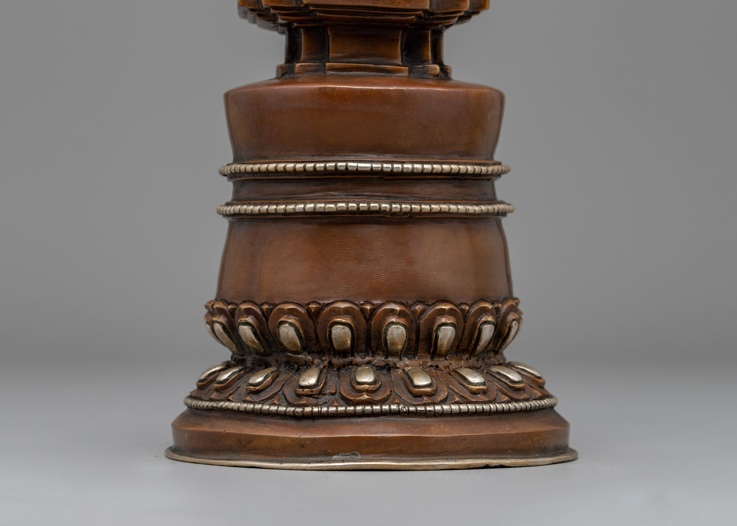 Elegant Tibetan Stupa with Silver Plating | Copper Body with Intricate Silver-Plated Spiral Dome