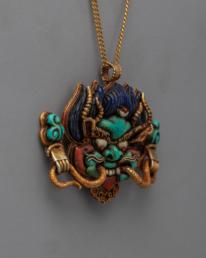 Bright and Symbolic Pure Gold Garuda Face Locket with Coral and Lapis Lazuli | Tibetan Amulet